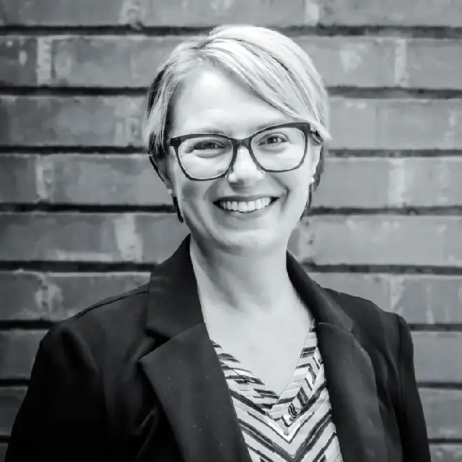 Joy White, VP of Consulting Services and Principal Consultant at Cura HR, professional black-and-white headshot representing strategic HR leadership and consulting expertise.